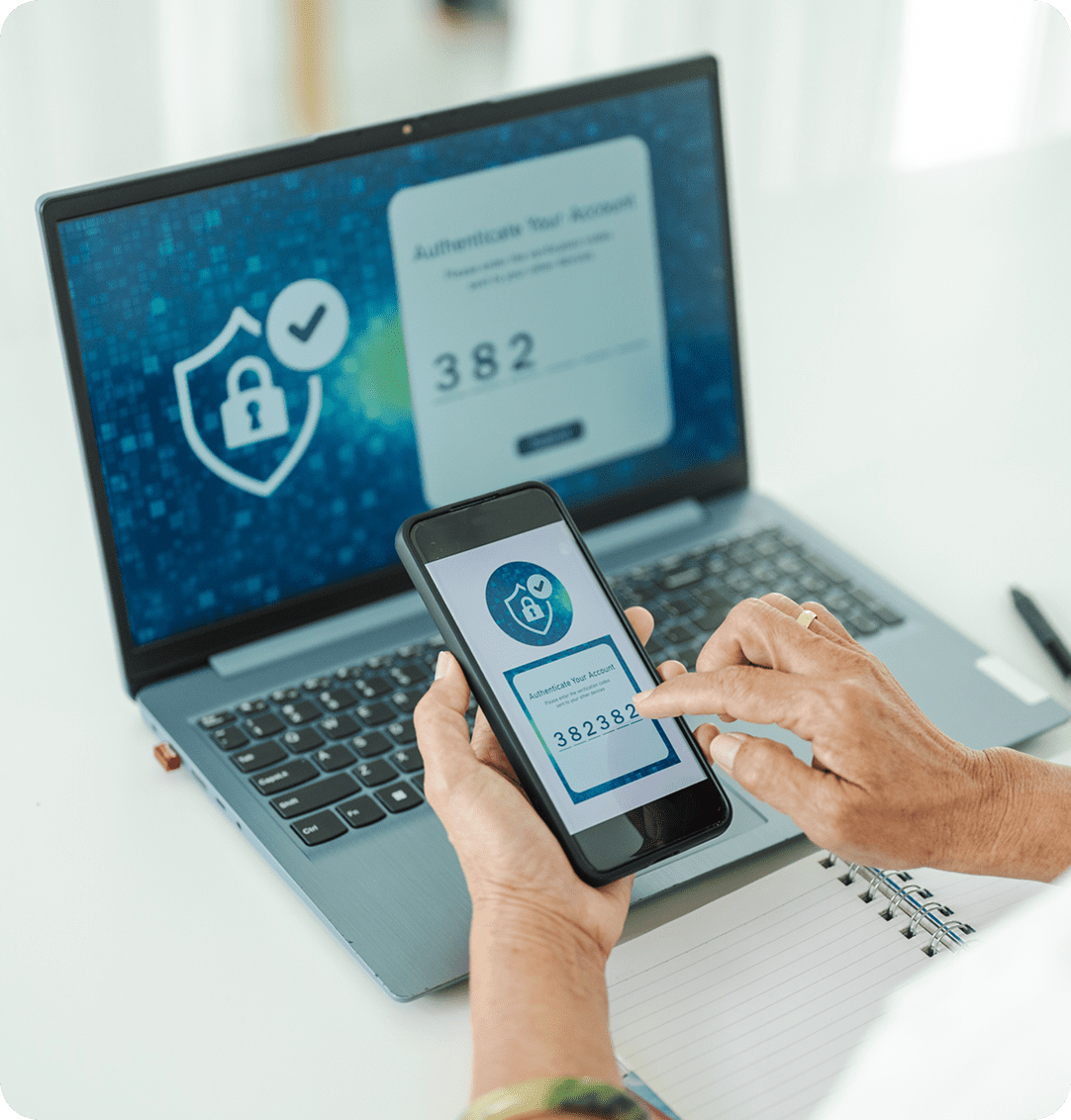 Phone and laptop showing authentication process