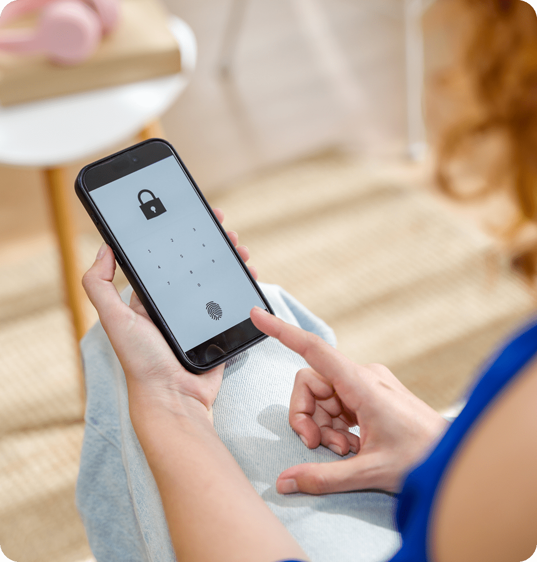 Person unlocking smartphone with fingerprint